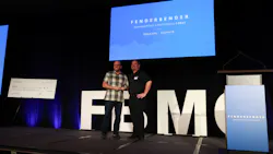 Dan Morrow, left, is congratulated on receiving the 2023 FenderBender Award from FenderBender Editor-in-Chief Jay Sicht.