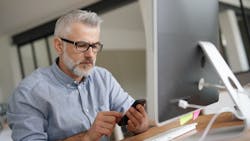 Business owner on the phone Business owner on the phone