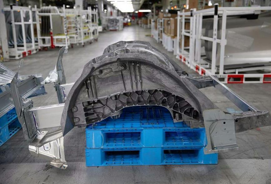 The rear underbody structure of the Model Y uses large die-castings instead of 70 separate pieces.