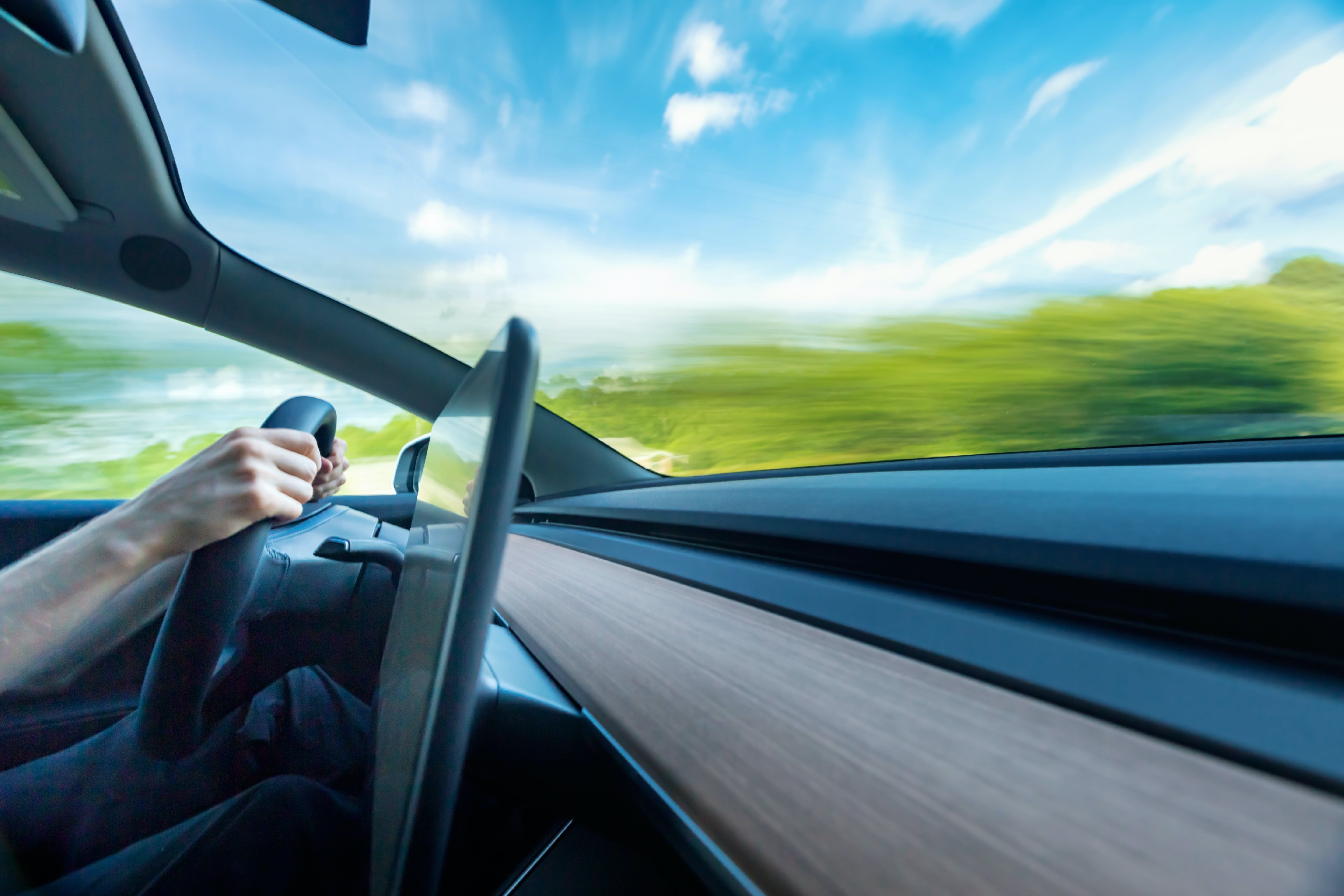 Tesla driving down the road