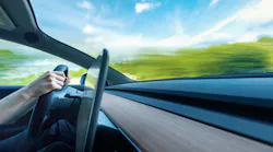 Tesla driving down the road