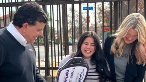 Ashley Avilla Recieving Check