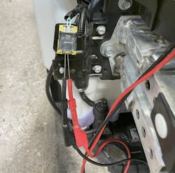 Figure 5- I unplugged the right-side crash sensor and placed my leads (RED to the outer-right terminal, BLACK to the outer-left terminal, with the connector lock facing up.) Figure 5- I unplugged the right-side crash sensor and placed my leads (RED to the outer-right terminal, BLACK to the outer-left terminal, with the connector lock facing up.)