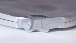 This SPR cutaway shows how the rivet holds the panels together. This SPR cutaway shows how the rivet holds the panels together.