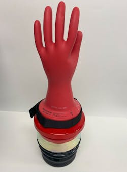 High-voltage gloves must be worn and either regularly tested for integrity, as shown, or replaced every six months and worn with leather overgloves to prevent punctures or tears. High-voltage gloves must be worn and either regularly tested for integrity, as shown, or replaced every six months and worn with leather overgloves to prevent punctures or tears.