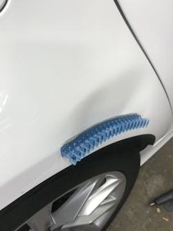 A KECO Centipede glued to a dent. A KECO Centipede glued to a dent.
