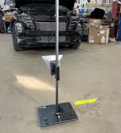 FIG5- The fifth calibration step is to place the target on the corner of the grid facing the radar unit and moving the target cone down to a point where the cone’s internal laser hits the center of the radar housing. FIG5- The fifth calibration step is to place the target on the corner of the grid facing the radar unit and moving the target cone down to a point where the cone’s internal laser hits the center of the radar housing.