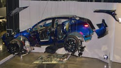 This exploded diagram 2023 Tesla Model Y is part of the &apos;Inside Tesla&apos; exhibit at The Petersen Automotive Museum.
