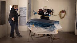 Danica Wooster working with MCST student Andrew Zuidema refinishing a hood in the paint booth. Danica Wooster working with MCST student Andrew Zuidema refinishing a hood in the paint booth.