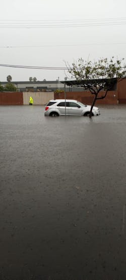 The outside of Southland Auto Body under flood