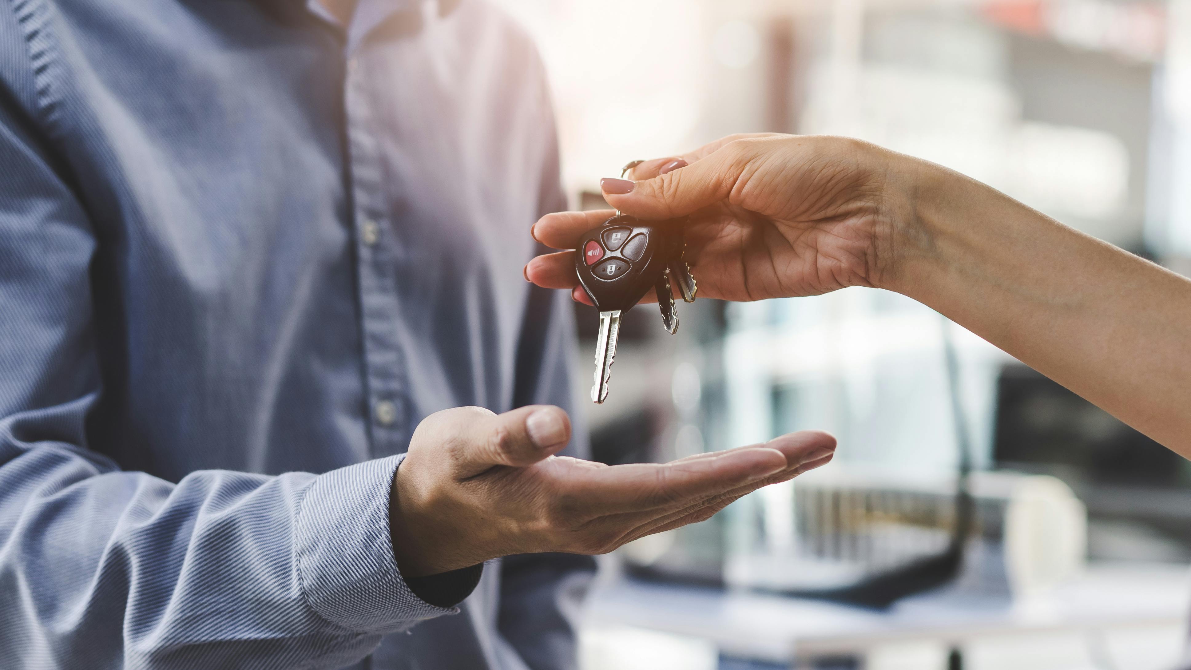 Customer handing over keys