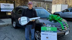 bruce_banks_in_front_of_his_new_car