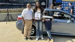 Olusola Smith receiving her refurbished 2022 Toyota Corolla .