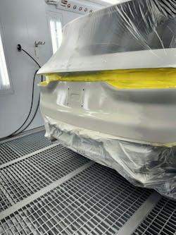 The ground coat is applied and stepped out to help the transition between layers. Remember when applying water that the coating needs to be completely dehydrated before you are able to see that actual color. It will ALWAYS look wrong when initially applying, as shown in this photo, as you see such a color contrast between the wet base coat and the panel. The ground coat is applied and stepped out to help the transition between layers. Remember when applying water that the coating needs to be completely dehydrated before you are able to see that actual color. It will ALWAYS look wrong when initially applying, as shown in this photo, as you see such a color contrast between the wet base coat and the panel.
