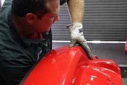 Pushing the dent out Pushing the dent out