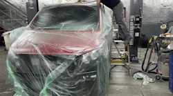 Into Pic tech J Hodge Using A Vacum Sander