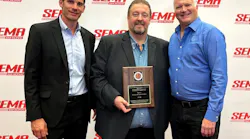 Figure 2- (left to right) Dirk Fuchs, I-CAR Director, Technical Programs & Services, and Bud Center, I-CAR Director, Technical Products & Curriculum, accepting the award receiving runner-up recognition for SEMA Best New Products Advanced Driver Assistance System (ADAS) product category.