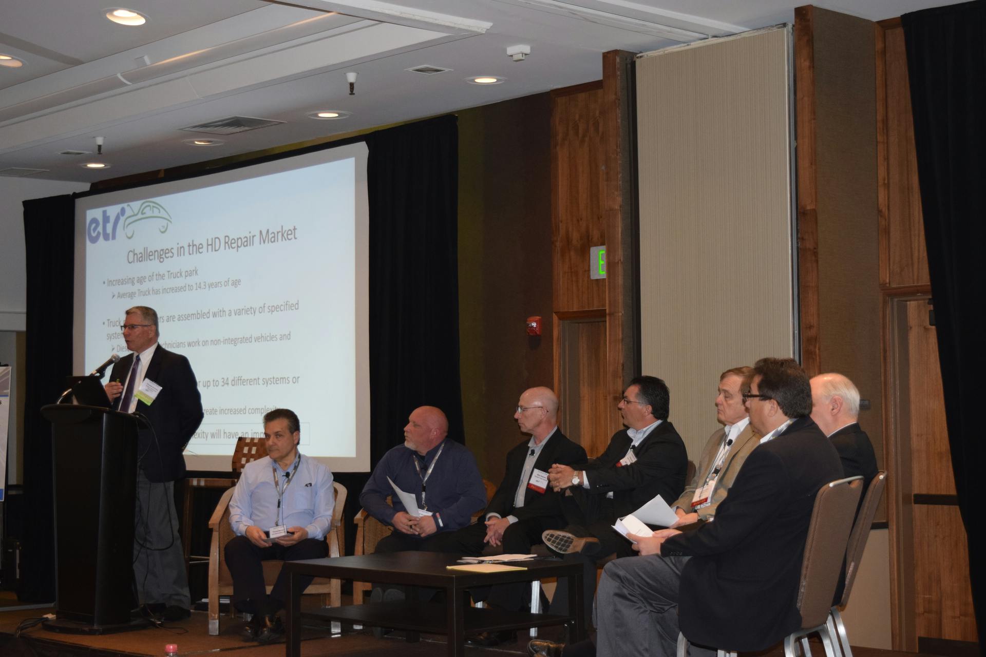 Tom Kotenko, Snap-on, moderates a discussion panel on 'Understanding the Heavy Duty MOU.' Panelists, from left to right: Tom Marchini, Senior Manager, Hino Motor Sales USA, Inc; Jeff Wurster, Senior Manager, Technical Support - Hino Motors Sales USA, Inc.; Mike Hasinec, Penske Trucking; Philip Aiello, Senior Project Manager Corporate Automotive Engineering, UPS; Larry Lovejoy, Senior Technical Advisor, Technology, Strategy & Architecture, Cummins; Dave Scheer, CEO of Inland Truck Parts; Mark Karon, President, Total Truck Parts; Roland Kingsbury, Isuzu Commercial Trucks.