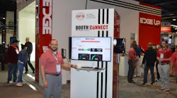 Matt Salvo, vice president of the aftermarket business unit at Global Finishing Solutions, shows on a monitor a sample of the data that can be collected from the company's Booth Connect, which debuted at the SEMA Show along with the new Edge paint booth.