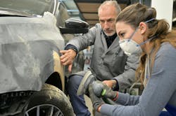 Collision repair instructor and student Collision repair instructor and student