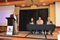 From Left, Moderator Paul Barry, CIECA executive director; Jake Rodenroth, Lucid Motors; Frank Phillips, Rivian; and Mark Allen, Audi of America; discuss &apos;EV Trends&apos; at the 2022 CONNEX in St. Charles, Missouri.