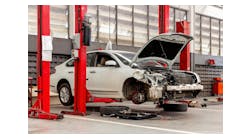 Collision-damaged car in dealership Collision-damaged car in dealership
