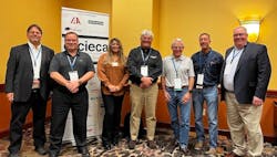Architecture Committee members are pictured at the 2022 CIECA CONNEX Conference in St. Charles, Mo. From l.: CIECA Past Chair Jeff Schroder, Car-Part.com; Andy Bober, Entegral; Paulette Reed, CIECA's technical project manager; Mike Hastings, Car-Part.com; Architecture Committee Chair Dan Webster, Enlyte; CIECA Chair Phil Martinez, Mitchell International; and Paul Barry, CIECA's executive director. Architecture Committee members are pictured at the 2022 CIECA CONNEX Conference in St. Charles, Mo. From l.: CIECA Past Chair Jeff Schroder, Car-Part.com; Andy Bober, Entegral; Paulette Reed, CIECA's technical project manager; Mike Hastings, Car-Part.com; Architecture Committee Chair Dan Webster, Enlyte; CIECA Chair Phil Martinez, Mitchell International; and Paul Barry, CIECA's executive director.