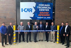 I-CAR’s Board of Directors Chair Kyle Thompson (center) is shown ready to cut the ribbon at the main entrance to the 48,000-square-foot facility. He is flanked by members of I-CAR’s leadership, including CEO & President John Van Alstyne (fourth from right). From l. are Mike Mertes, Tom Marek, James Busam, Jeff Peevy, Thompson, Tim O’Day, Van Alstyne, Jon Petrillo, Bud Center, and Dirk Fuchs. I-CAR’s Board of Directors Chair Kyle Thompson (center) is shown ready to cut the ribbon at the main entrance to the 48,000-square-foot facility. He is flanked by members of I-CAR’s leadership, including CEO & President John Van Alstyne (fourth from right). From l. are Mike Mertes, Tom Marek, James Busam, Jeff Peevy, Thompson, Tim O’Day, Van Alstyne, Jon Petrillo, Bud Center, and Dirk Fuchs.