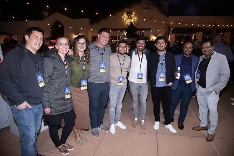(Left to Right): Steve, Cara, Jill and Tom Matthews, owners of Maaco in Dolton, IL, and AP, Kishan, Vasu, Nick and Jay Patel, who own 11 Maaco locations across the Midwest.