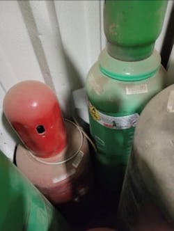 KEEP SEPARATE: Oxygen and acetylene bottles must not be stored together, as shown here. KEEP SEPARATE: Oxygen and acetylene bottles must not be stored together, as shown here.