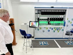Bob Pearson, CEO of Pearson Auto Body, shows off the new semiautomated PPG MoonWalk paint mixing system at Newgate School. Bob Pearson, CEO of Pearson Auto Body, shows off the new semiautomated PPG MoonWalk paint mixing system at Newgate School.