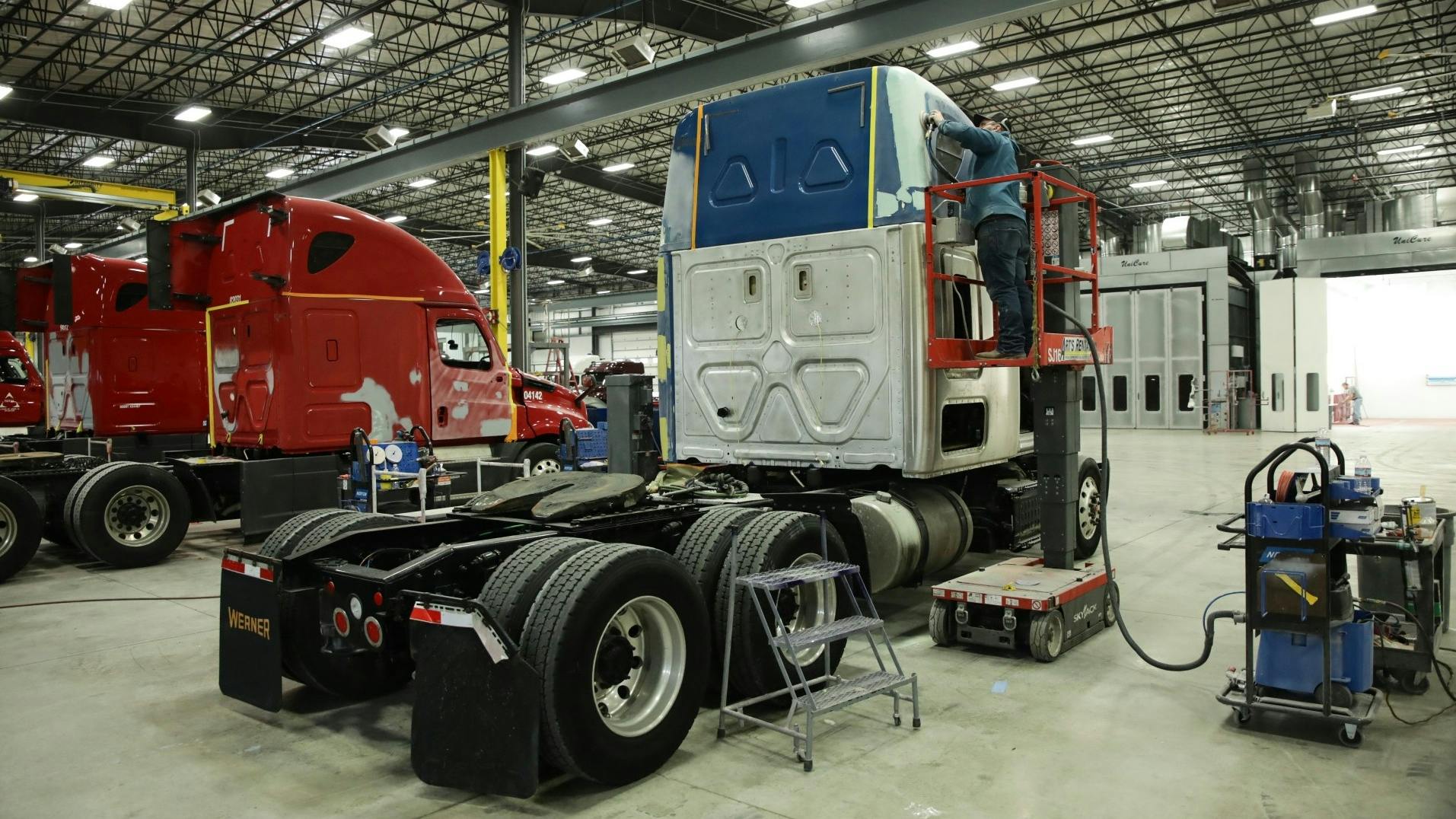 Dollies, overhead trolleys and hoists, and personnel lifts (pictured) increase productivity at FCR&rsquo;s shops.