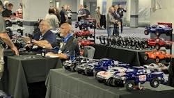 Instructors and other attendees hand out radio-control cars for test drives at the ASE Instructor Training Conference on Wednesday, July 17. Instructors and other attendees hand out radio-control cars for test drives at the ASE Instructor Training Conference on Wednesday, July 17.