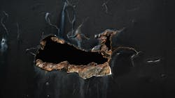 Rusted-out sheet metal Rusted-out sheet metal