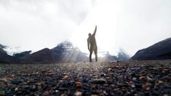 Dramatic Silhouette Victorious With Fist In Air On Summit Dramatic Silhouette Victorious With Fist In Air On Summit