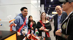 Techs for Tomorrow 2023 winners visit the Sagola booth.