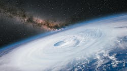 This stock image of a hurricane viewed from a NASA satellite shows the Milky Way galaxy at sunset. This stock image of a hurricane viewed from a NASA satellite shows the Milky Way galaxy at sunset.