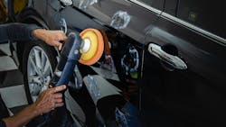 Technician with buffer Technician with buffer