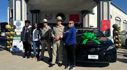 From left: Letitia Salazar, two Riverside sheriff’s deputies who attended the event, Sophia Heard and her son.
