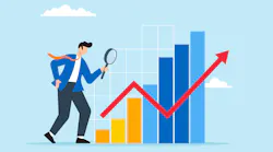 Businessman examining chart