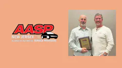 Jerry McNee poses with AASP/NJ President Ken Miller.