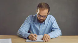 Man taking notes