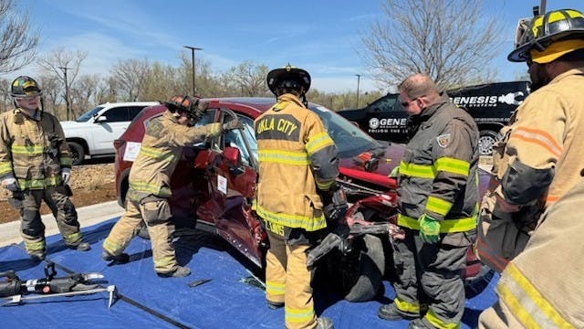 Members of the Guthrie Fire Department and surrounding areas get hands-on experience in emergency vehicle extraction as part of the NABC FREE program on March 29.