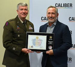 Caliber Chief People Officer David Dart, right, with Brig. Gen. Charles W. Morrison during the signing ceremony to celebrate Caliber's partnership with the Partnership for Your Success Program on April 3. Caliber Chief People Officer David Dart, right, with Brig. Gen. Charles W. Morrison during the signing ceremony to celebrate Caliber's partnership with the Partnership for Your Success Program on April 3.
