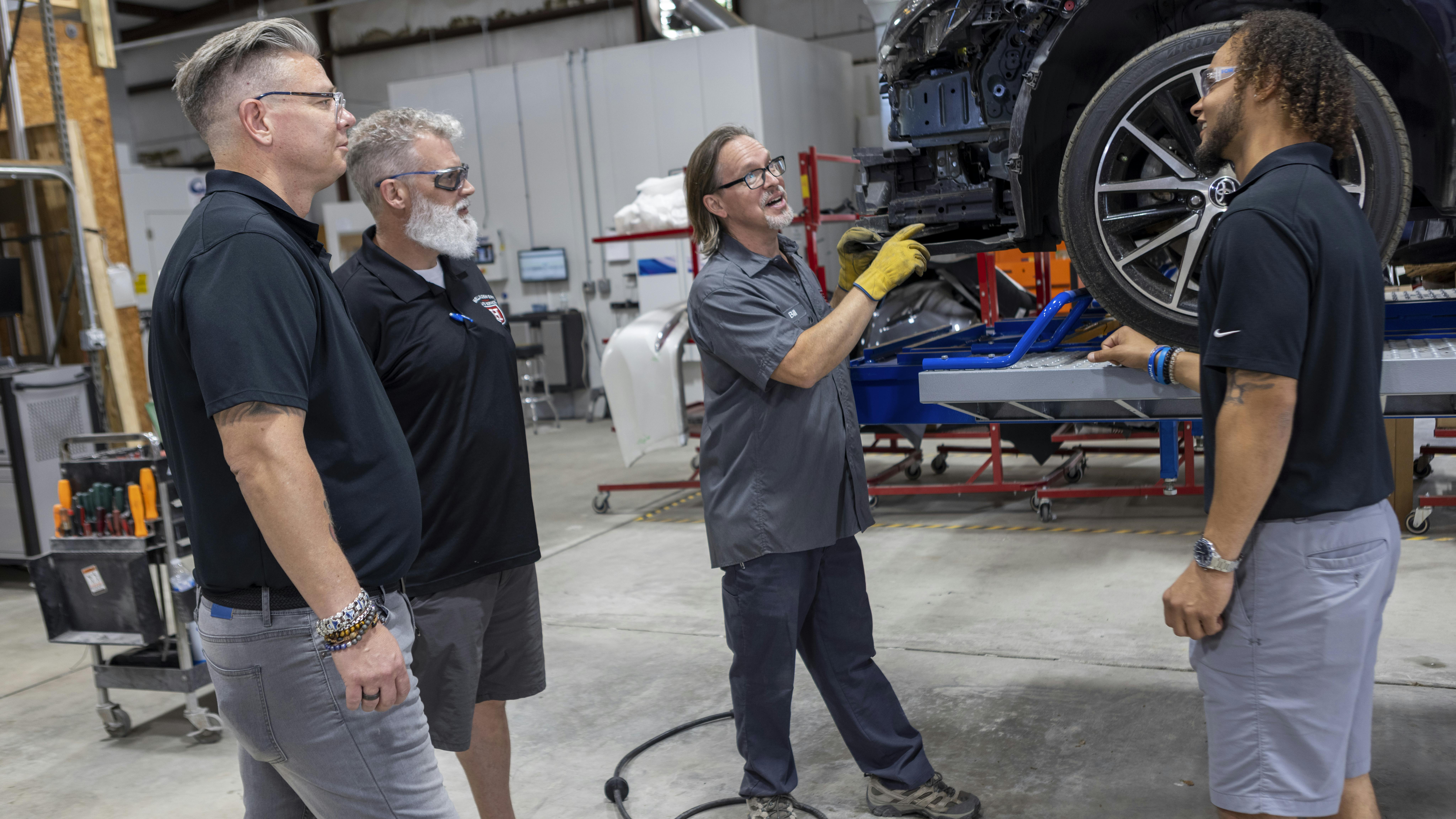 THE NEXT GENERATION: James Ivanowski's (left) oldest son, Jonah (far right) works as an estimator and is involved in most high-level decisions for the business.