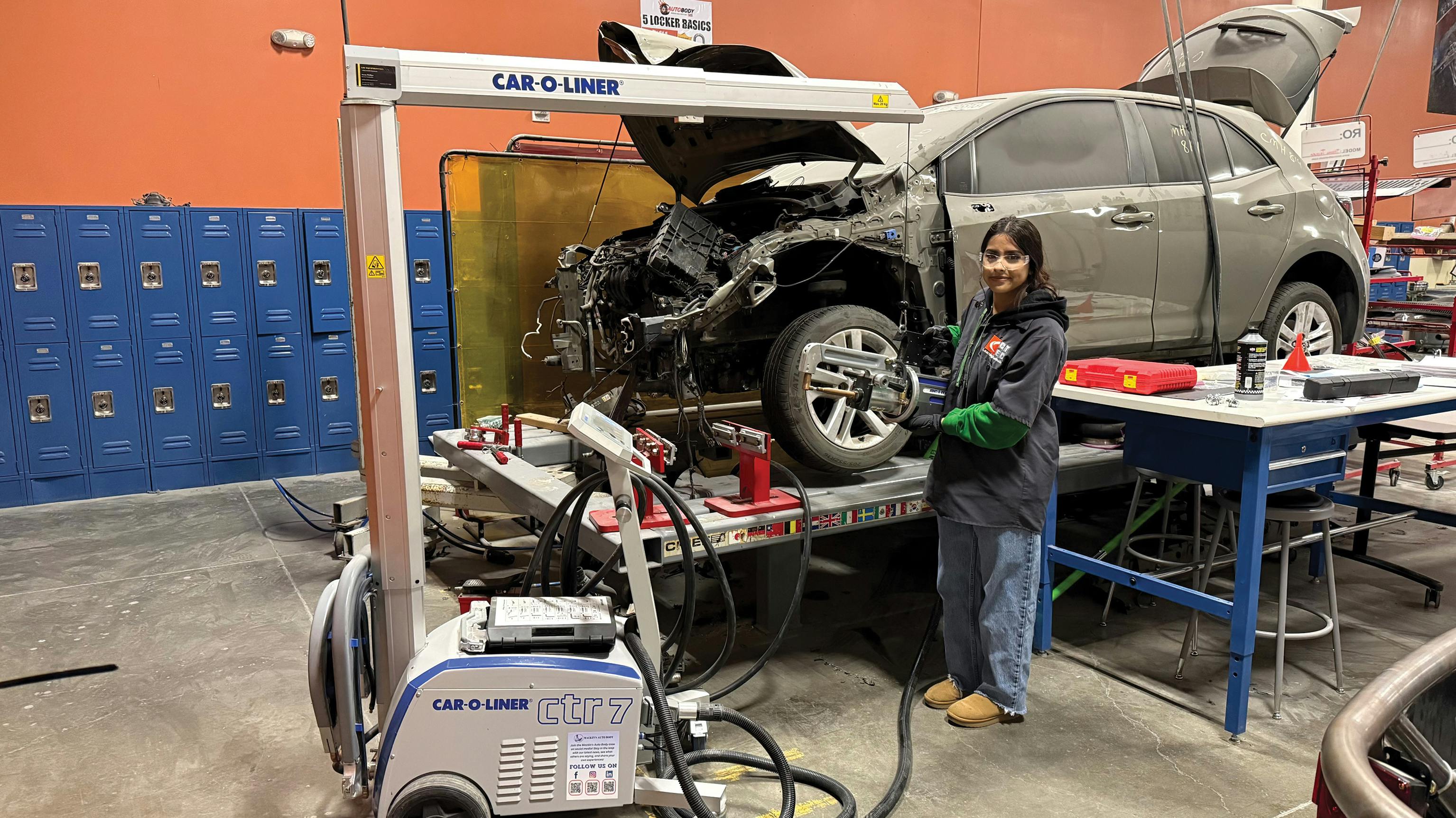 CTEC Student Azul works with a Car-O-Liner CTR 7 Spot Welder, donated by Mackin's Auto Body.