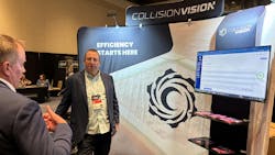 BUILT FOR EFFICIENCY: Dan Dent (right) demonstrates the platform to Les Pawlowski, general manager of Symach, at the recent Certified Collision Group Conference in Nashville, Tennessee. BUILT FOR EFFICIENCY: Dan Dent (right) demonstrates the platform to Les Pawlowski, general manager of Symach, at the recent Certified Collision Group Conference in Nashville, Tennessee.