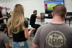 COORDINATED EFFORT: Makeig meets with team leads during a morning production meeting. COORDINATED EFFORT: Makeig meets with team leads during a morning production meeting.