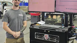 COMMAND CENTER: Anthony McNee uses the McStud Estimating Tool, on the left screen, to quickly calculate estimates and transfer the results into the estimating system.