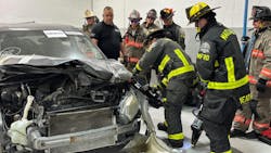 Members of the Seminole County, Maitland, and Winter Park Fire Departments participate in hands-on training as part of the National Auto Body Council on September 4 in Orlando, Florida. Members of the Seminole County, Maitland, and Winter Park Fire Departments participate in hands-on training as part of the National Auto Body Council on September 4 in Orlando, Florida.